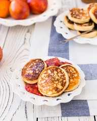 Curd cheese cakes with honey and red oranges