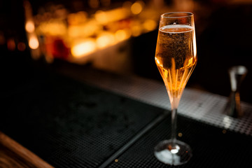 Glass of champagne in the bar night club party