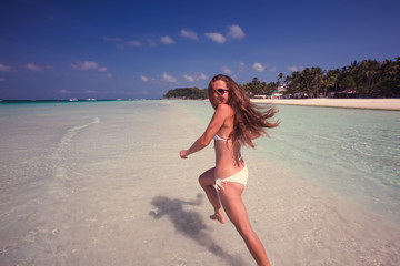 Woman rests at the sea on Boracay island, Philippines