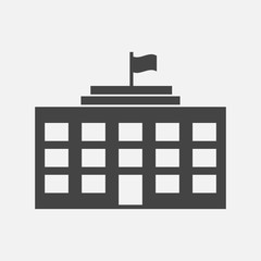 Vector icon of a business office building on a gray background