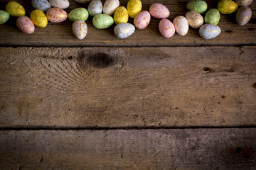 Easter eggs on wooden background. 
