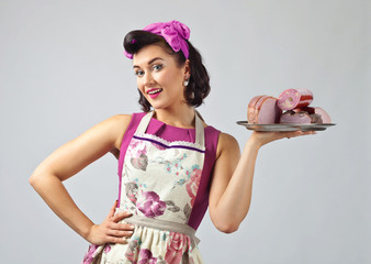 Beautiful woman with smoked meat and sausage.