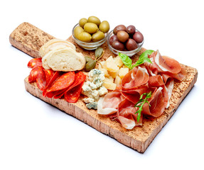 Italian prosciutto crudo or spanish jamon, cheese, olives and bread