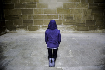 Woman on her knees