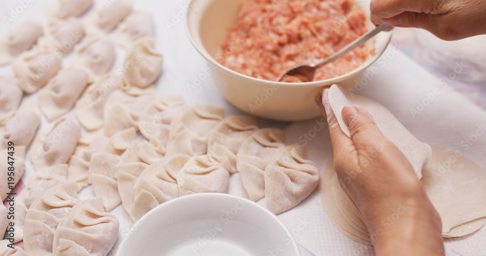 Canvas Prints making meat dumpling at home