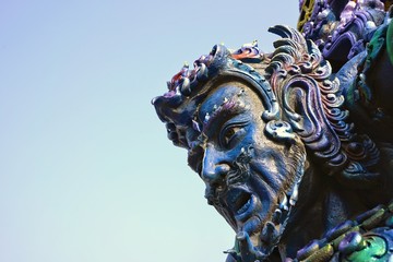 Fototapeta na wymiar Head of giant Thai guardian statue or warrior statue in public Buddhism temple of Thailand