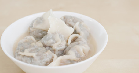 Eating soap meat dumpling