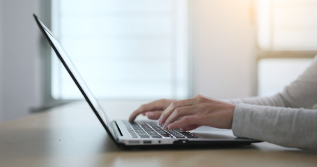 Woman working on laptop computer