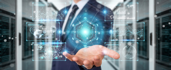 Businessman using digital screens interface with holograms datas 3D rendering