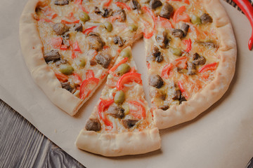 pizza,mushroom,wooden,table,cheese,tasty,homemade,food,tomato,closeup,baked,red,fresh,italian,mozzarella,cuisine,dinner,meal,snack,sauce,background,delicious,traditional,crust,basil,mushrooms,pepper,d