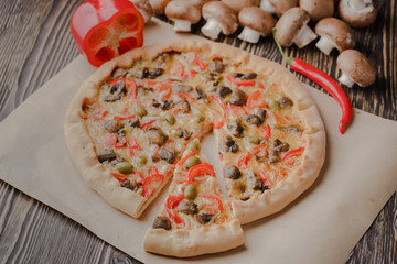 pizza,mushroom,wooden,table,cheese,tasty,homemade,food,tomato,closeup,baked,red,fresh,italian,mozzarella,cuisine,dinner,meal,snack,sauce,background,delicious,traditional,crust,basil,mushrooms,pepper,d
