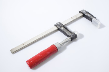 Clamp for wood in a white background composition