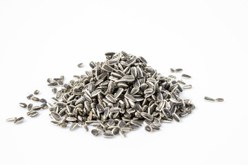 Sunflower seeds in a white background composition