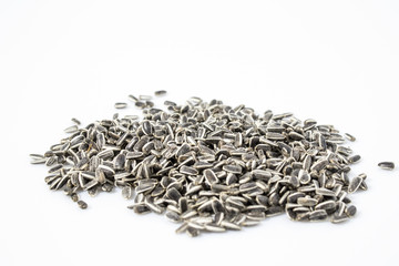Sunflower seeds in a white background composition