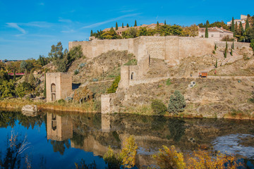 Fototapeta na wymiar Saint Martin Bridge across Tagus River, Toledo, Spain