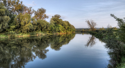 River Landscape At Sunset. HDR Photo.