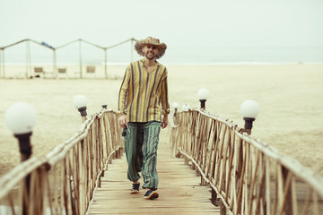 man on the beach in india, ocean, coast, vacation. rest on goa