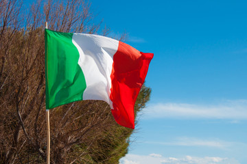 Waving in the wind the Italian flag