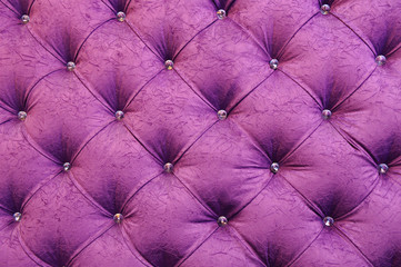 Upholstered furniture with fabric plating in rhombus. Purple colour