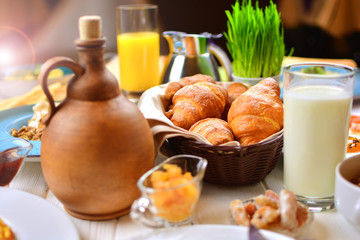 Tasty croissants and fresh, natural breakfast. Healthy food background.