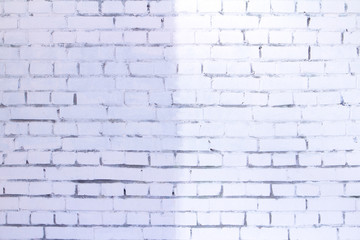 light and shadow on white brick wall background texture