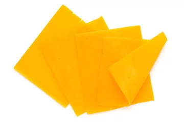 Rolgordijnen Cheddar cheese slice isolated on the white background. © gitusik