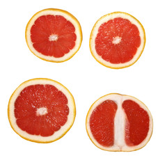 Fresh delicious pieces of grapefruit isolated on white background. Creative minimalistic food concept.