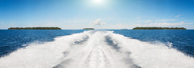 Background water surface behind of fast moving motor boat in vintage retro style