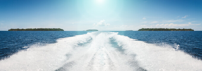 Background water surface behind of fast moving motor boat in vintage retro style