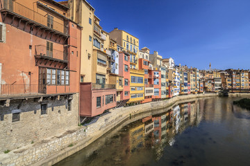 Fototapeta na wymiar City view, colored houses over river, Girona, Catalonia.Spain.