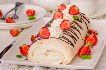 Meringue roll cake Pavlova with cream and strawberry