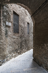 Narrow and ancient street, historic center of Girona,Catalonia,Spain.