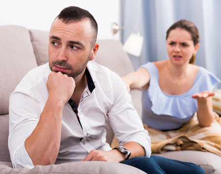 Sad male is depressing and husband is supporting him