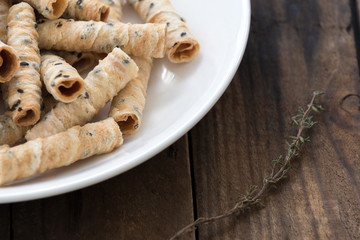 bread stick or rolled wafer, a traditional dessert in Thailand

