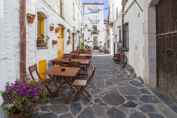 Narrow street in town of Cadaques,Costa Brava, province Girona, Catalonia.Spain.