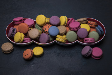 macaroon cookies on the dark table