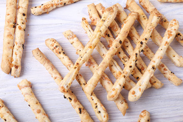 Breadsticks on wooden background. Top view