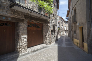 Fototapeta na wymiar Narrow street in village of Castellfollit de la Roca,Catalonia,Spain.