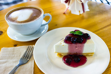 Blueberry Cheese pie with coffee ready for the day.
