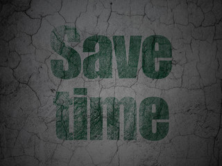 Time concept: Green Save Time on grunge textured concrete wall background