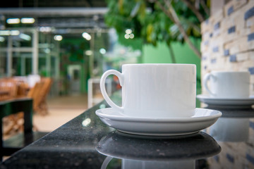 Cup of coffee on the table