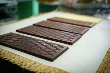 Bars of white, dark, bitter an milk chocolate