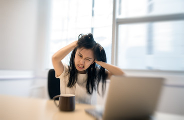 business woman getting fidgety in the office