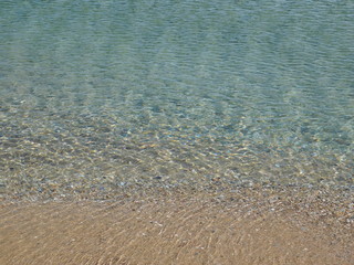 A beautiful sandy beach with clear water, in Attica, Greece	