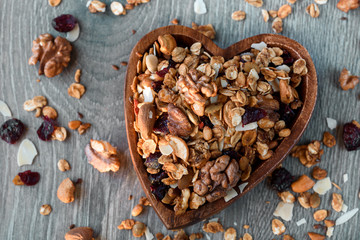 homemade granola in wooden bowl