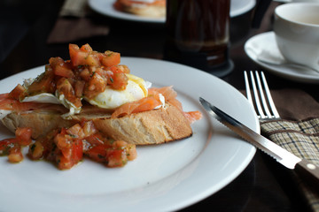 Sandwich with tomatoes, fish and eggs