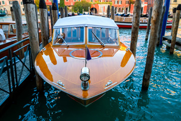 Fototapeta na wymiar Wooden retro boat taxi in Venice