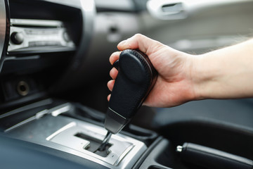 Assembly view of the of The male and switches the automatic transmission's close-up. Close-up of...