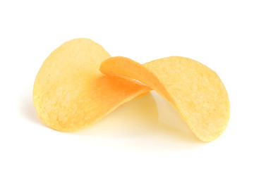 two potato chips on white background close-up