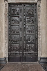 Massive solid brass antique door with ornaments closed
